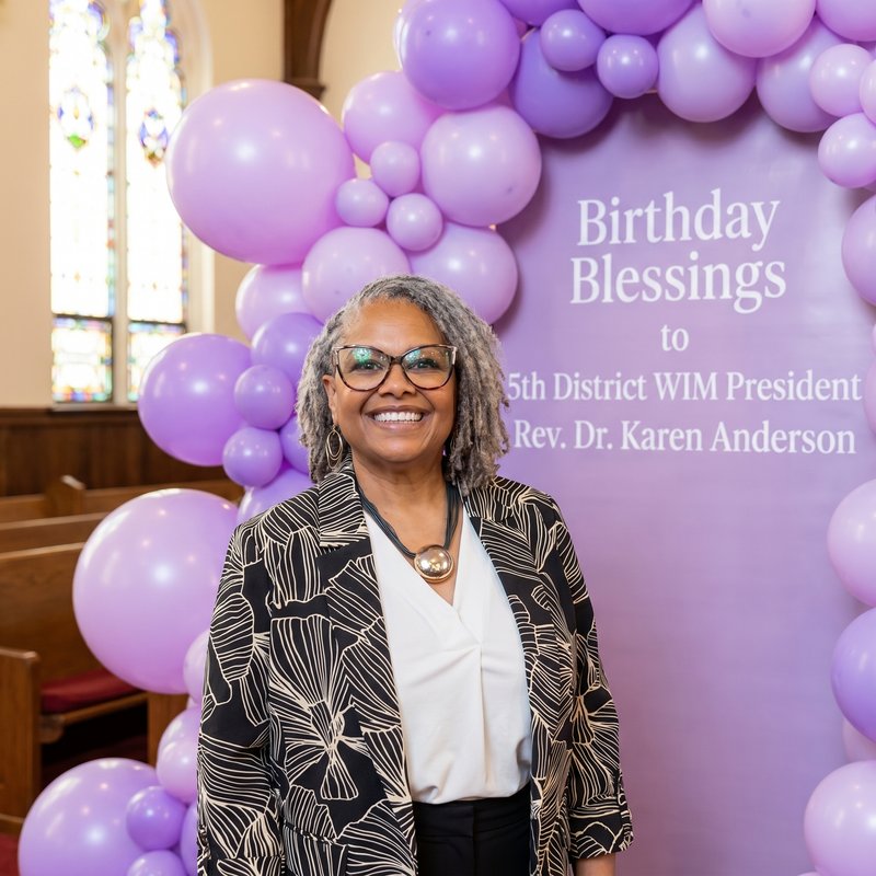 Lavendar Birthday Ballons in a Church environment with the message "Birthday …
